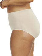 a woman wearing a beige brief panty