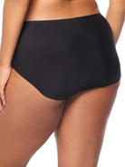 a woman wearing a black brief panty